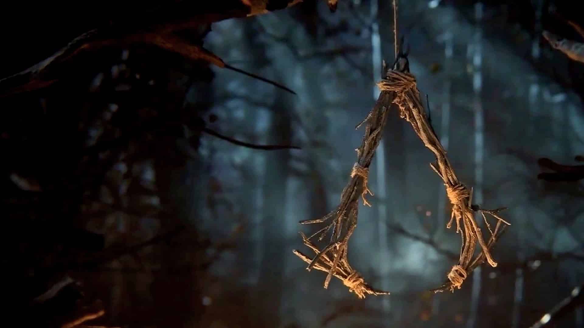 (The Assassin logo, made from twigs, immediately evokes memories of talismans and totems hung to keep evil away).