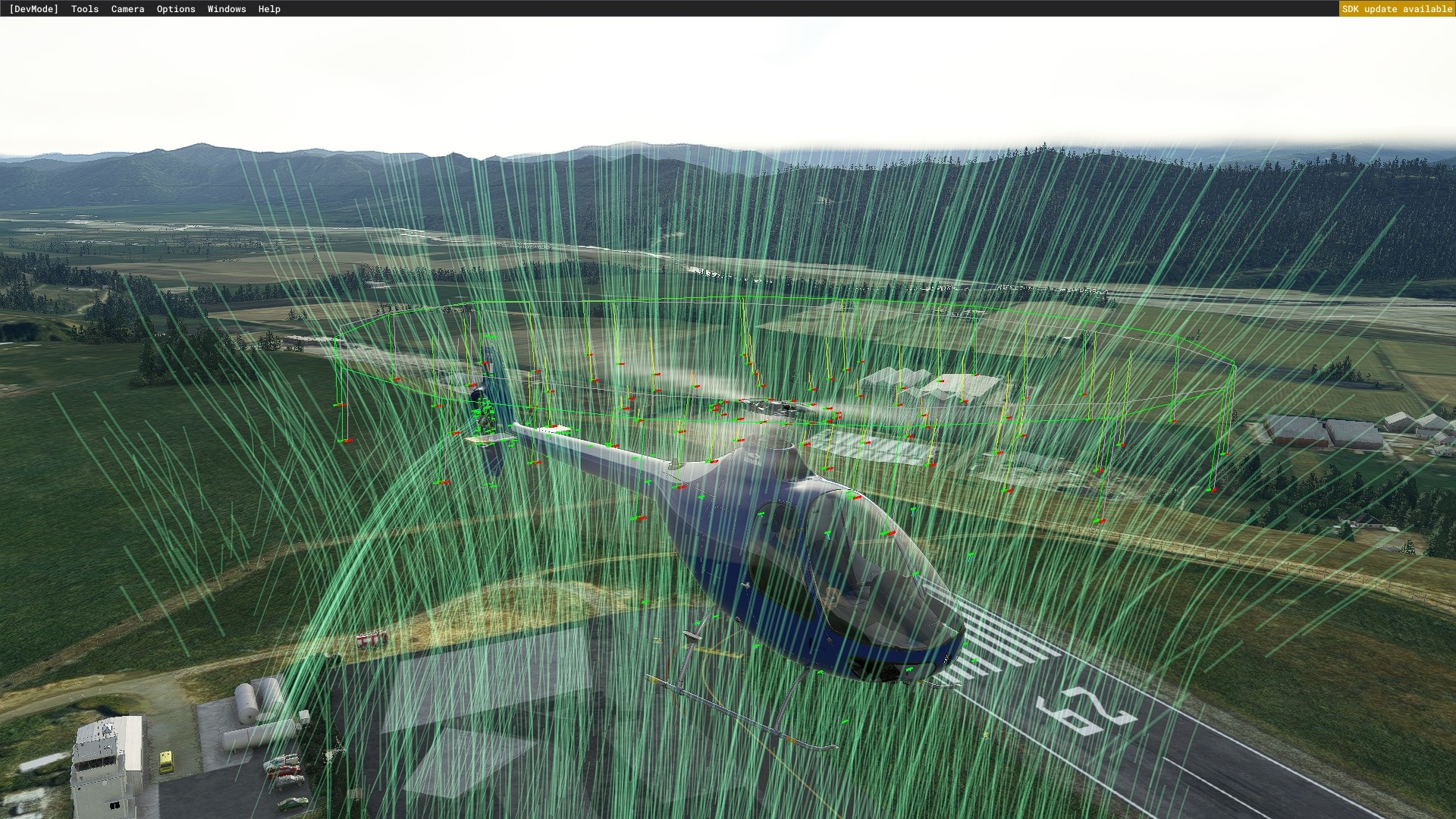 (I bez vývojářského režimu je k dispozici nová vizualizace proudění vzduchu na letadle (zde světle modré čáry na vrtulníku a kolem něj).