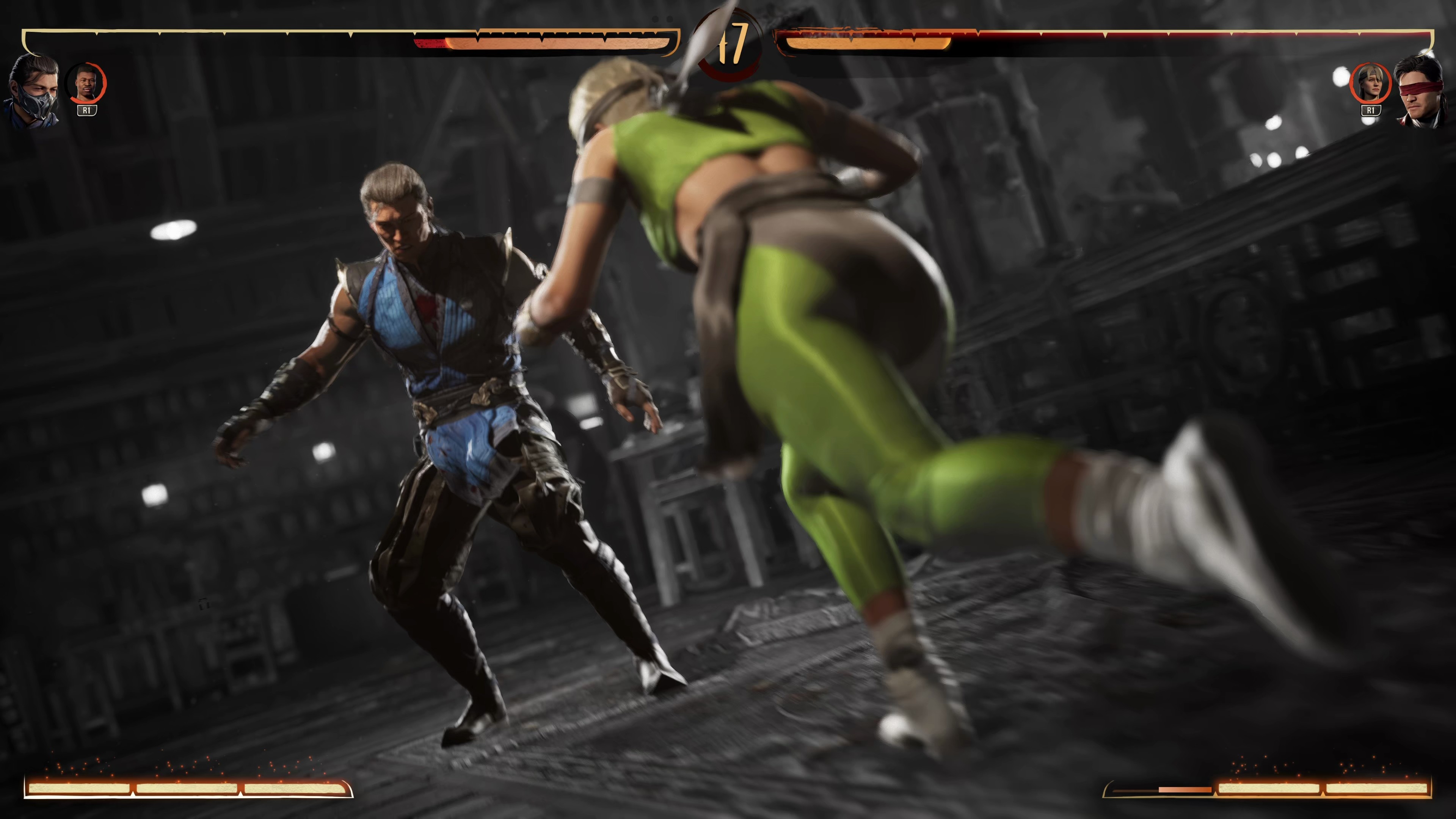 (Sonya jumps into the action at the drop of a hat and gives Sub Zero a painful kick to the ribs here.)