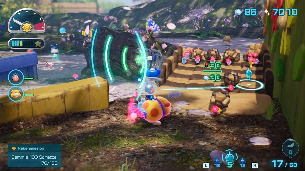 (Nuestros Pikmin construyen un puente con materia prima. Usamos el objeto radar para llamar a más Pikmin hacia nosotros. Nuestro Beagle flota al fondo a la izquierda)