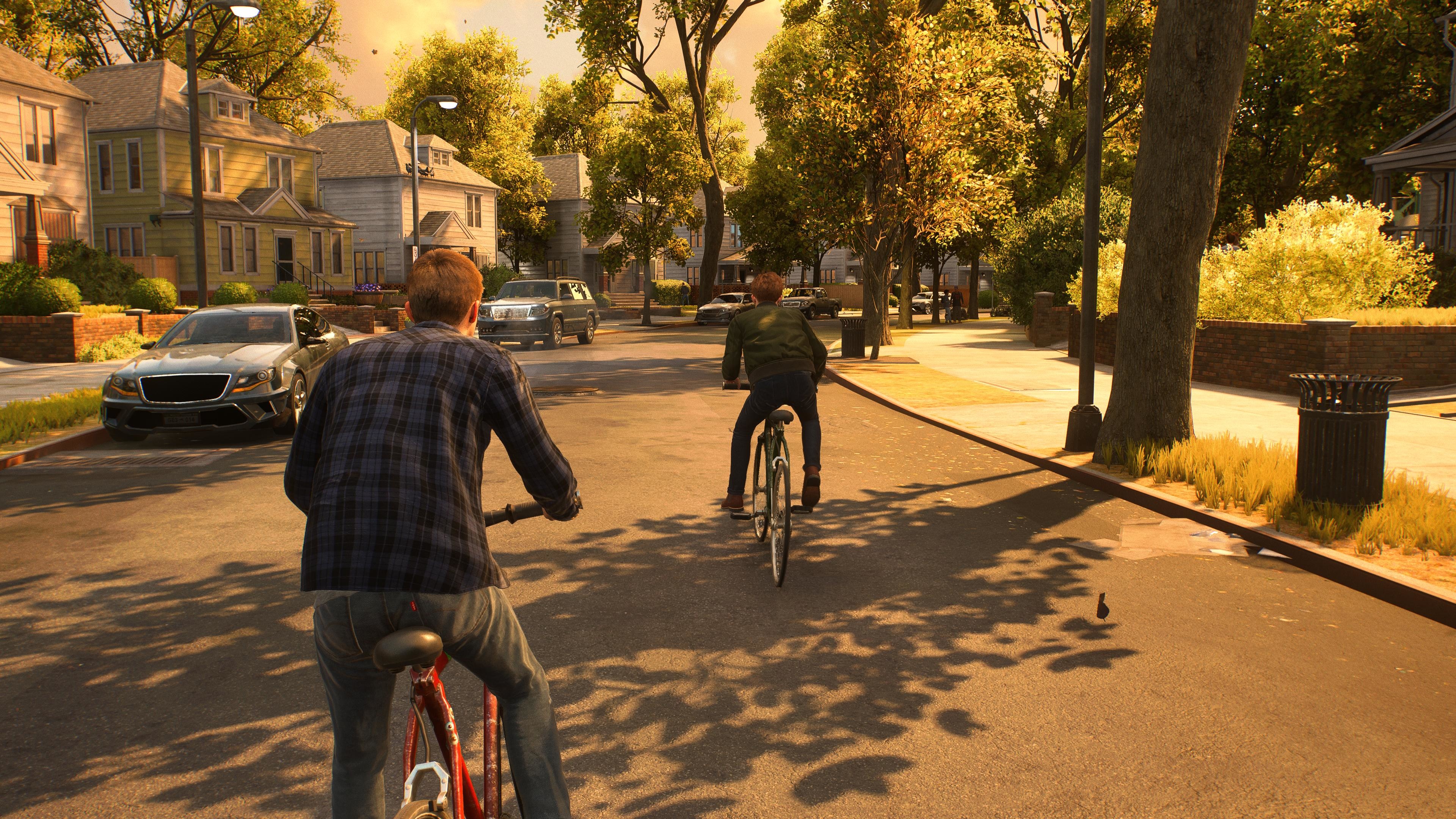 (Peter and Harry reminisce while riding bikes through Queens. Spider Man 2 can do more than just action.)